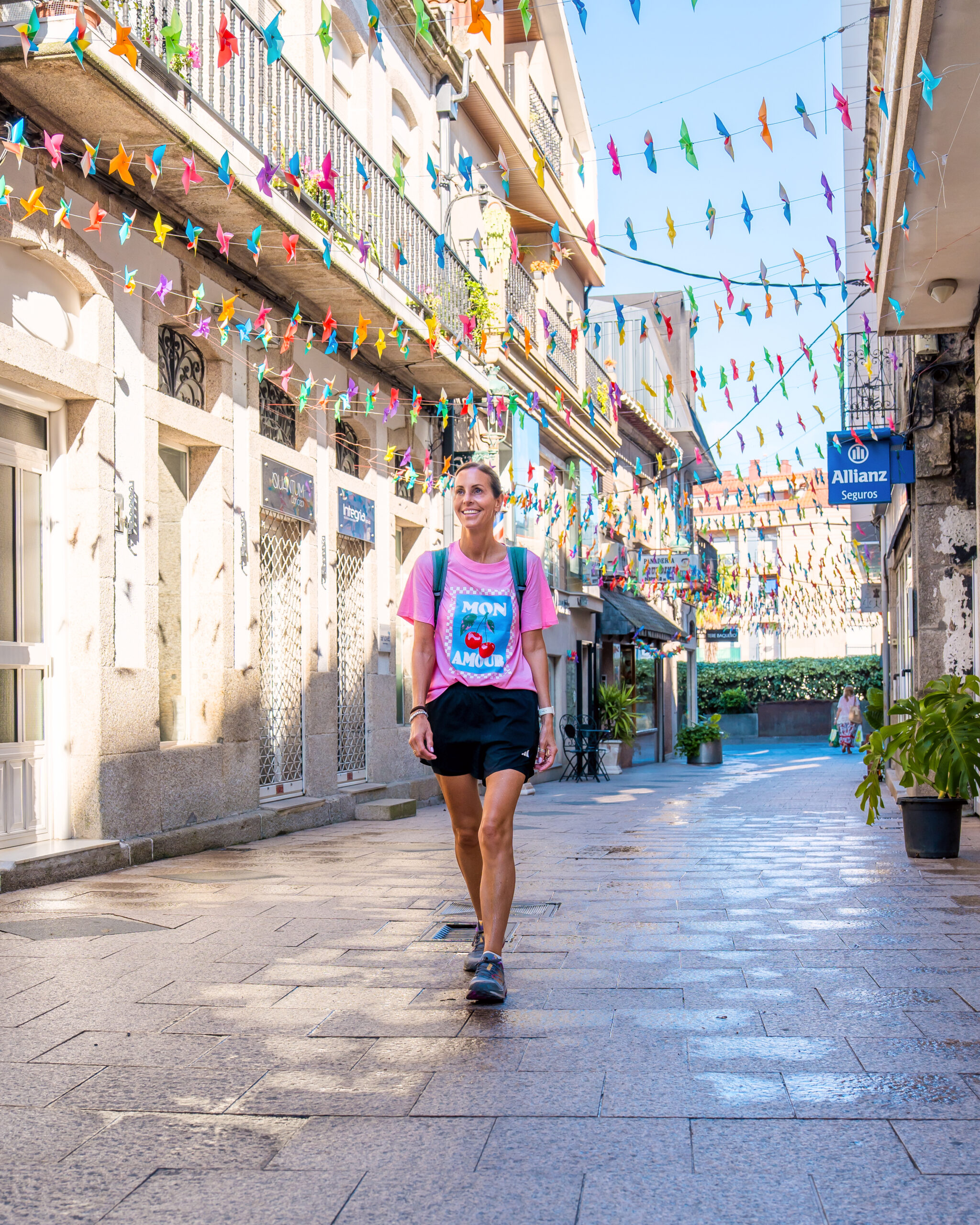 Woman walking in O'Porrino on Portuguese Camino